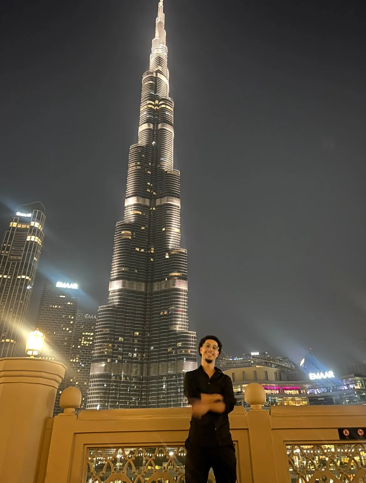 Rvsan in Dubai with the Burj Khalifa behind him